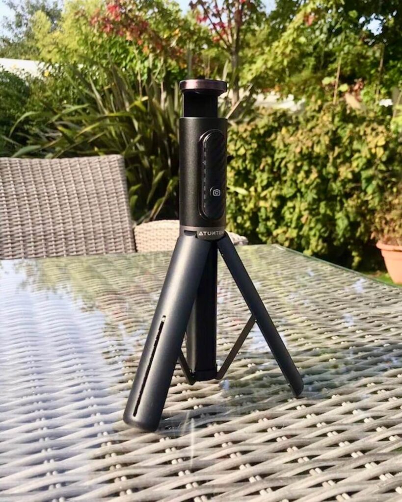 Small tripod on table in garden