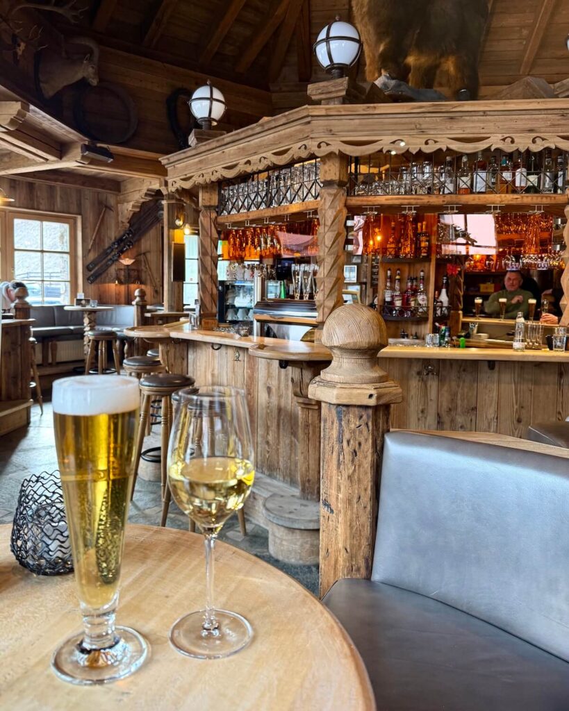 White wine and beer on table at Grizzly Bar in Solden