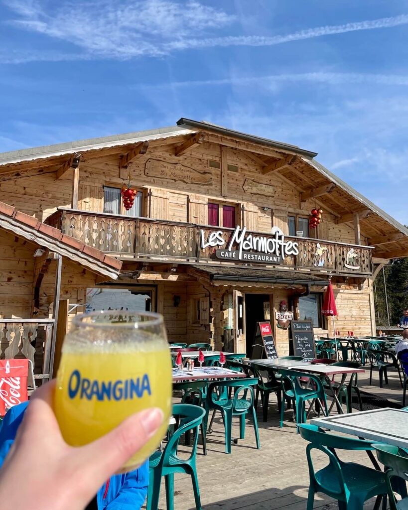 Orangina drink break at Les Marmottes at Bernex ski resort