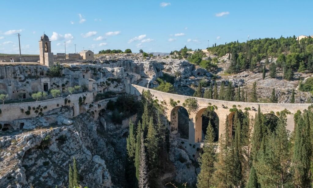 Gravina in Puglia viaduct with trees from the ravine as tall
