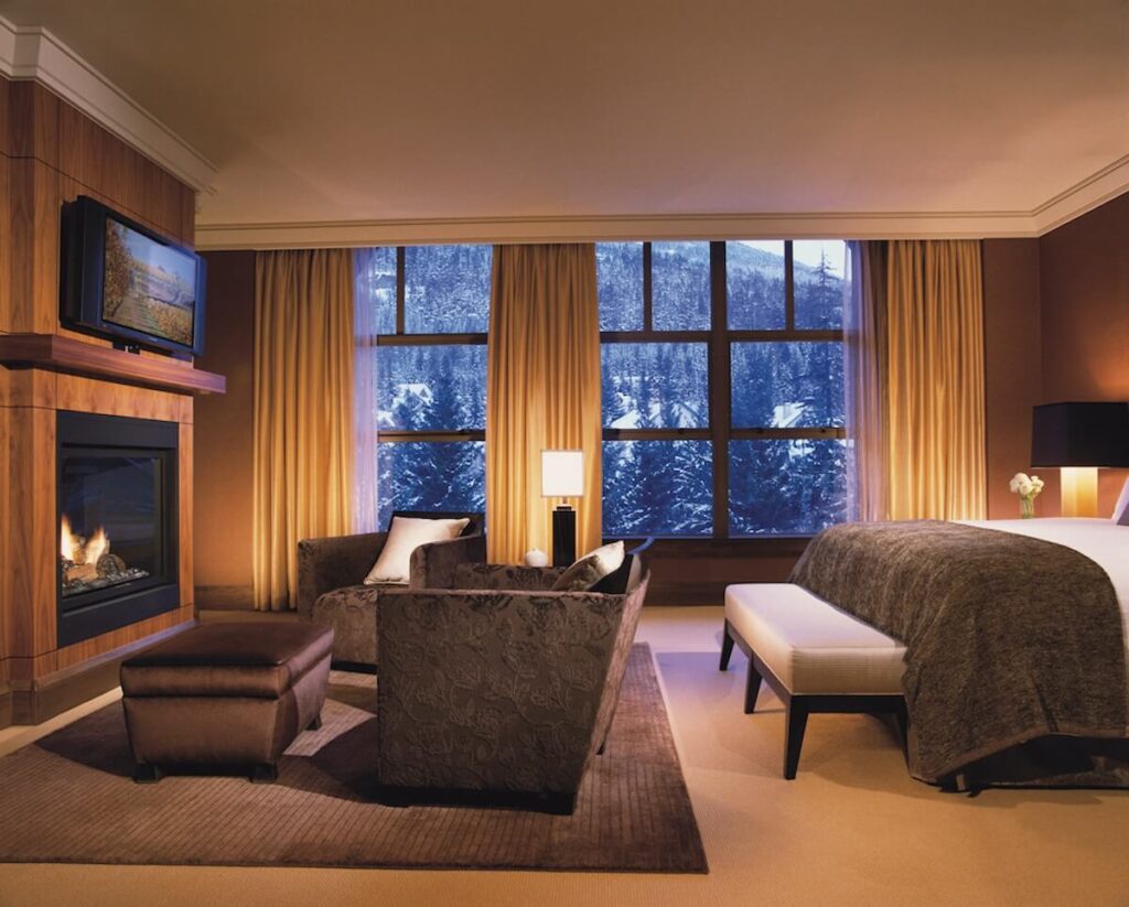 Four Seasons Whistler room with snowy and dimly lit room view