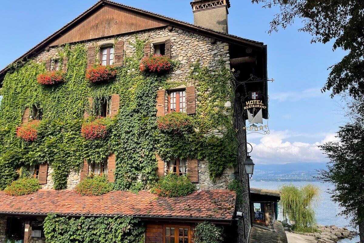 Hotel du Port covered in vines with lakeview - walking around old town is the best thing to do in Yvoire
