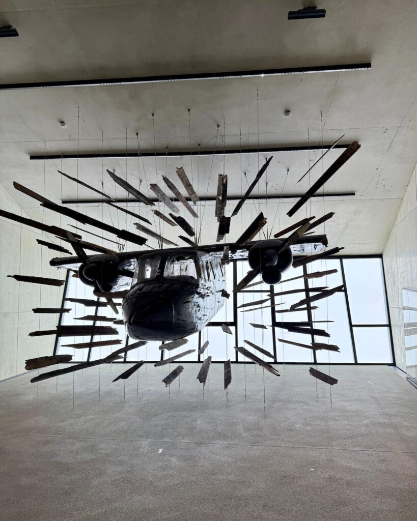 Plane scene from James Bond Spectre in Elements exhibition in Solden with concrete floor and foggy view in the window